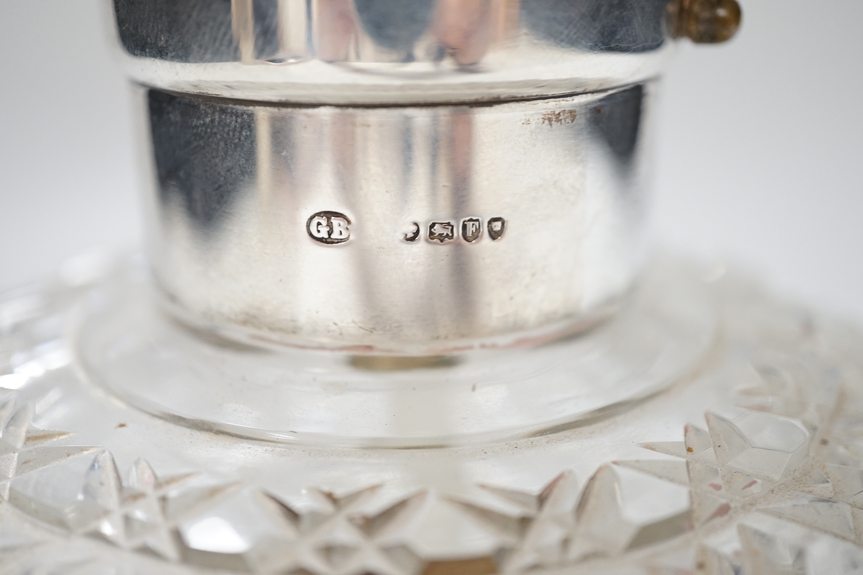 A large Victorian silver mounted globular cut glass atomiser, the lid with pump action button, the body with hobnail cutting, makers initials GB, London 1881, height 16.5cm